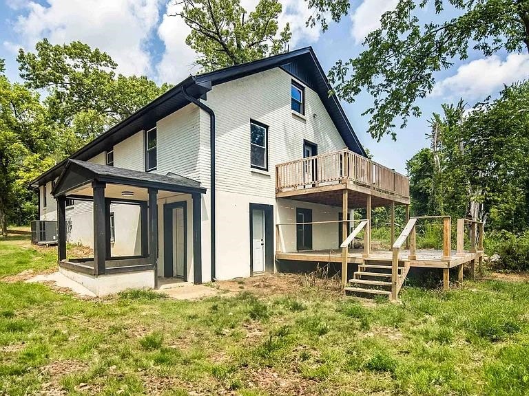 7441 Walsh Road Millington, TN 38053 - Photo 15 of 16 a backyard of a house with table and chairs