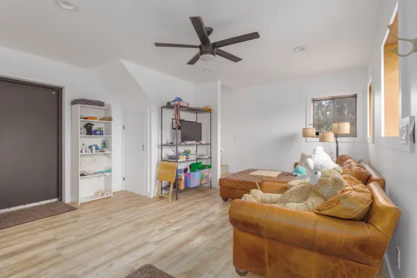 a bed room with a bed and a window