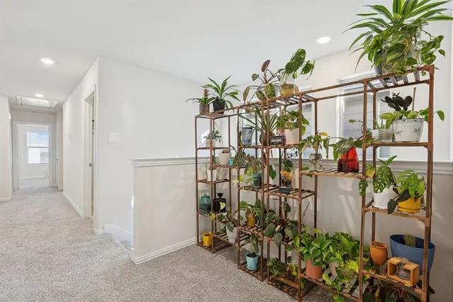 a kitchen with a sink a stove and cabinets