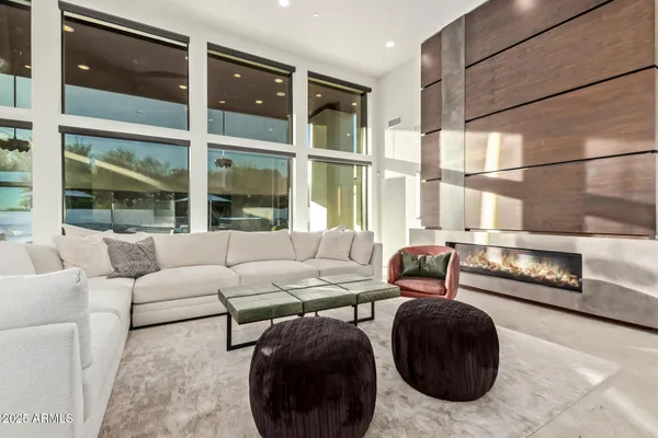 a kitchen with stainless steel appliances kitchen island granite countertop a sink and cabinets