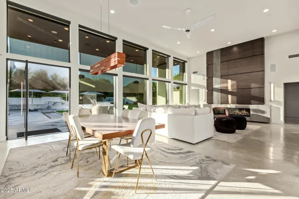 a kitchen with stainless steel appliances granite countertop a sink and a stove