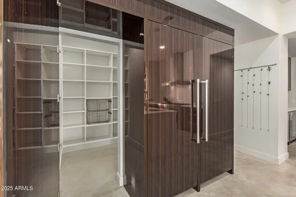 a room with a table and chairs