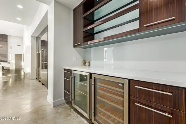 a bedroom with a large bed and a large window