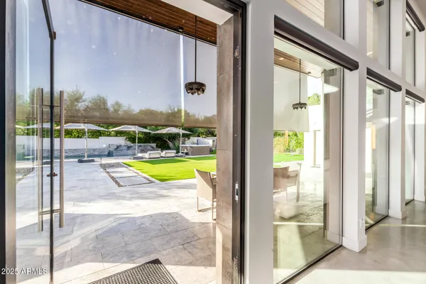 a spacious bathroom with a tub sink shower and mirror