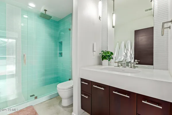 a utility room with sink dryer and washer