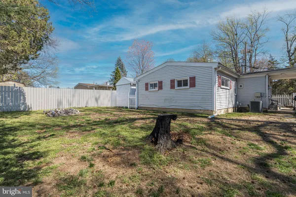 a house view with a backyard space