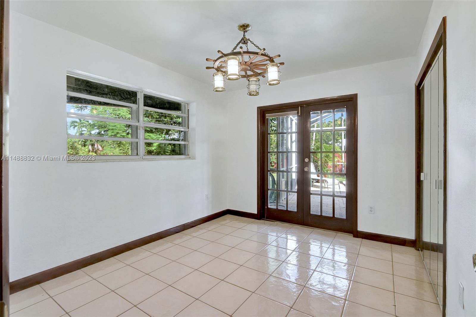 10455 Southwest 112th Street Miami, FL 33176 - Photo 13 of 21 a view of an empty room with a window