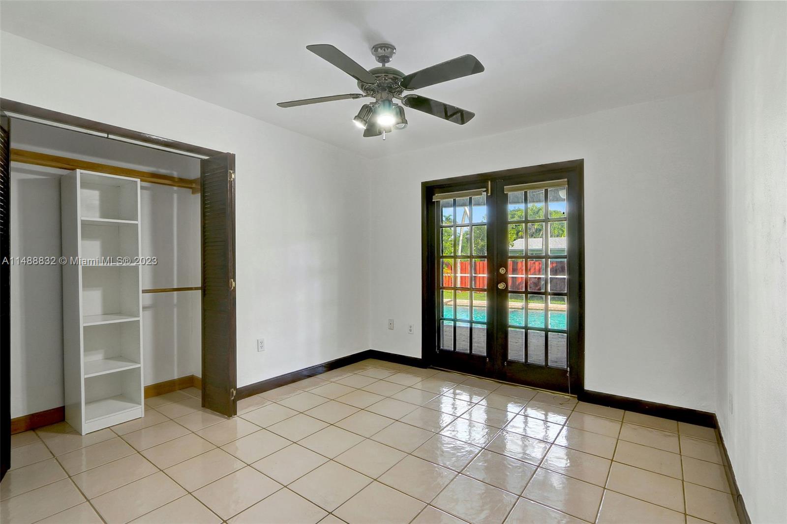10455 Southwest 112th Street Miami, FL 33176 - Photo 18 of 21 a view of an empty room with a window