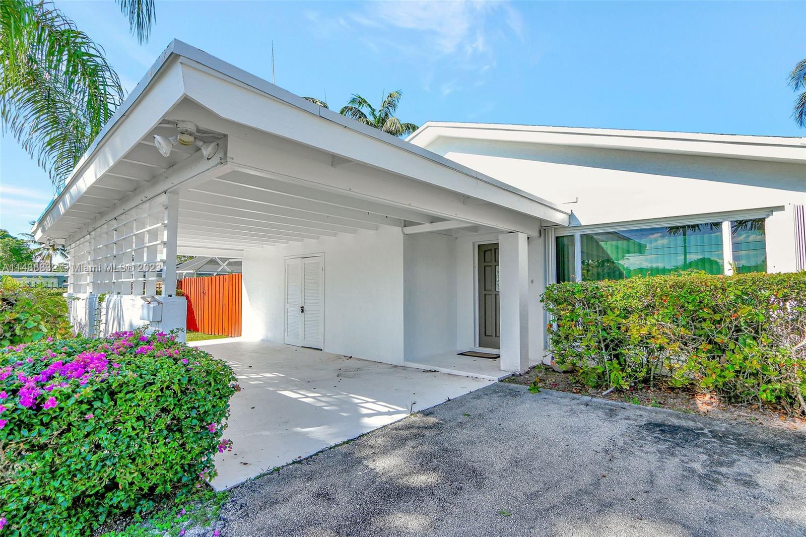 10455 Southwest 112th Street Miami, FL 33176 - Photo 3 of 21 a front view of house with an entryway