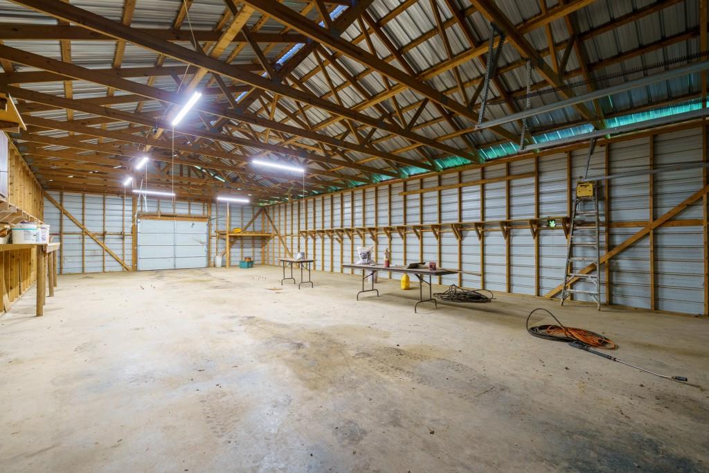 176 Big Oak Tree Road Northwest Adairsville, GA 30103 - Photo 59 of 77 a view of a empty room with gym equipment