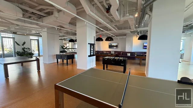 a kitchen with stainless steel appliances granite countertop a stove and a refrigerator