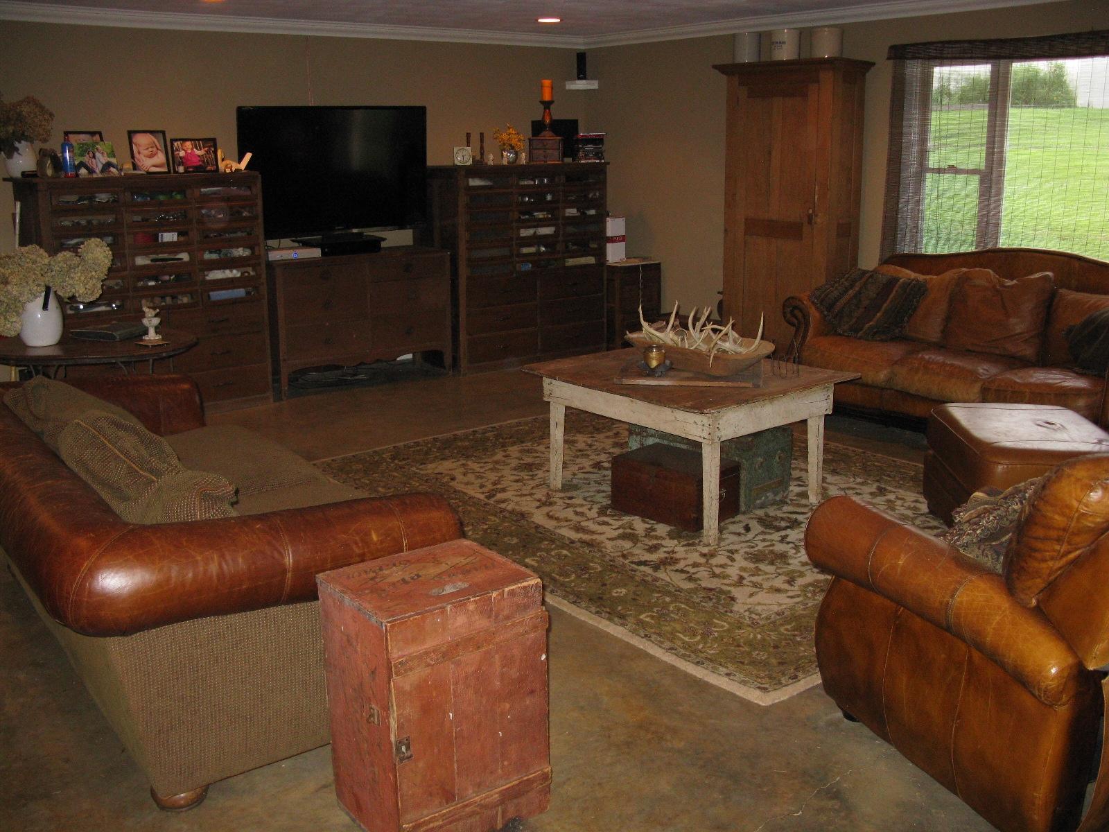 3970 Foothills Road Callaway, VA 24067 - Photo 29 of 41 a living room with furniture a flat screen tv and a window