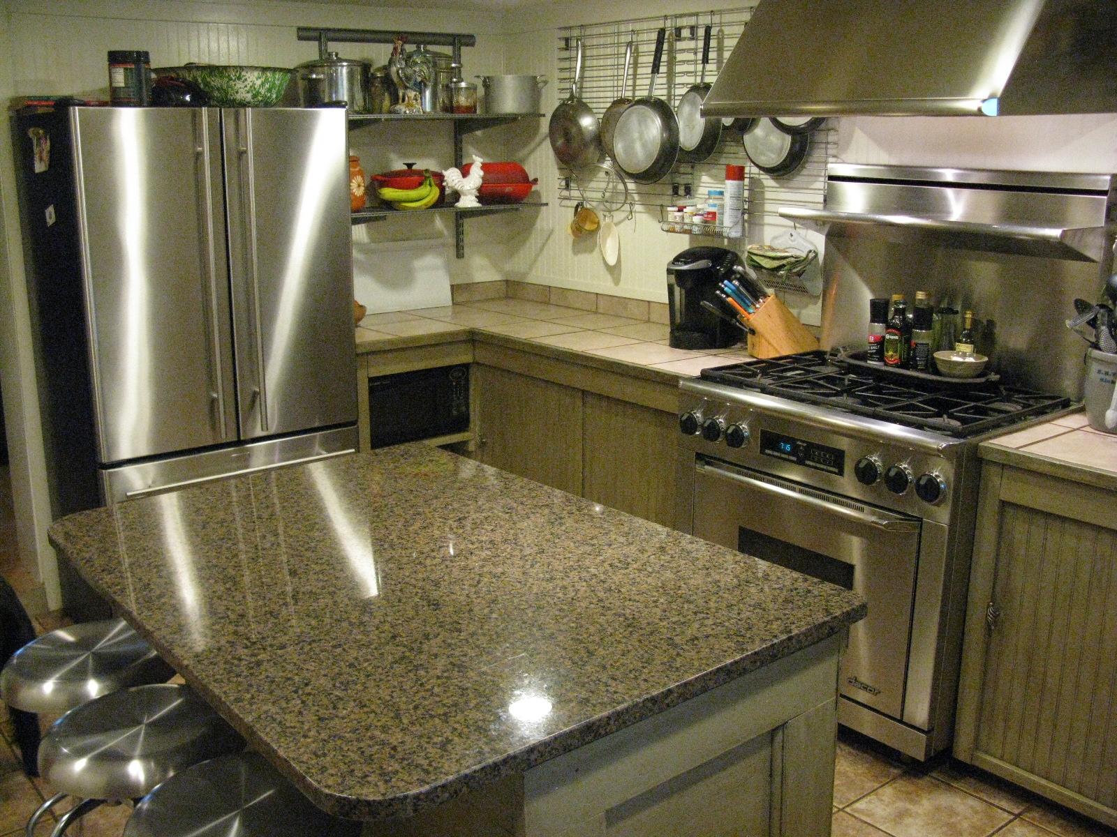 3970 Foothills Road Callaway, VA 24067 - Photo 34 of 41 a kitchen with stainless steel appliances granite countertop a sink a stove and a refrigerator