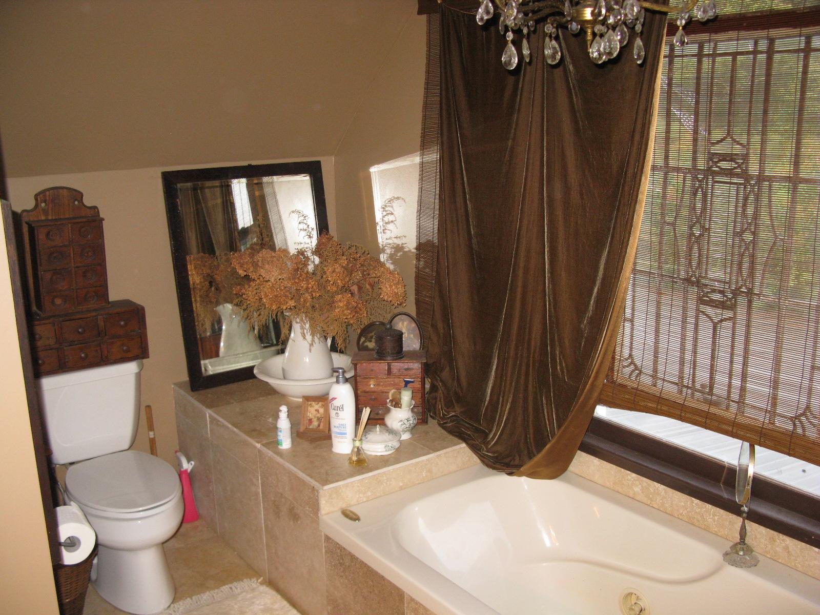 3970 Foothills Road Callaway, VA 24067 - Photo 38 of 41 a bathroom with a toilet a sink and a shower