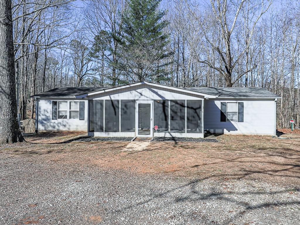 499 Rutledge Lane Canton, GA 30114 - Photo 1 of 1 a house with yard in front of it
