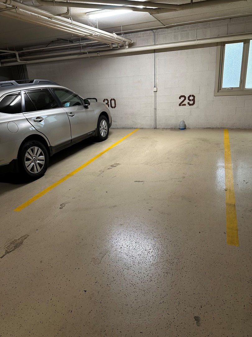6460 West Belle Plaine Avenue, Unit 407 Chicago, IL 60634 - Photo 15 of 15 a view of car garage