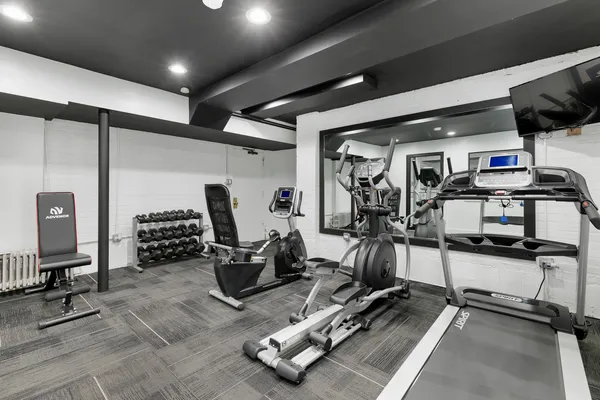 a view of a room with gym equipment