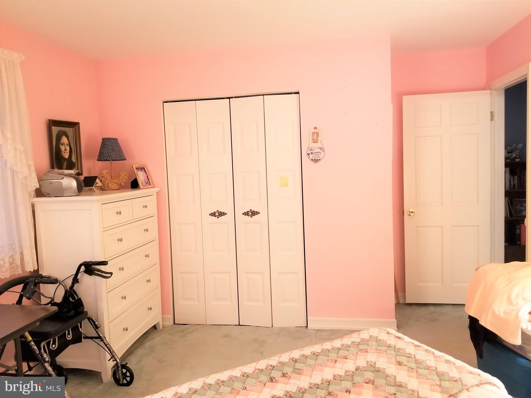 150 Kansas Road Pennsville, NJ 08070 - Photo 12 of 20 a view of a bedroom with bed and dresser
