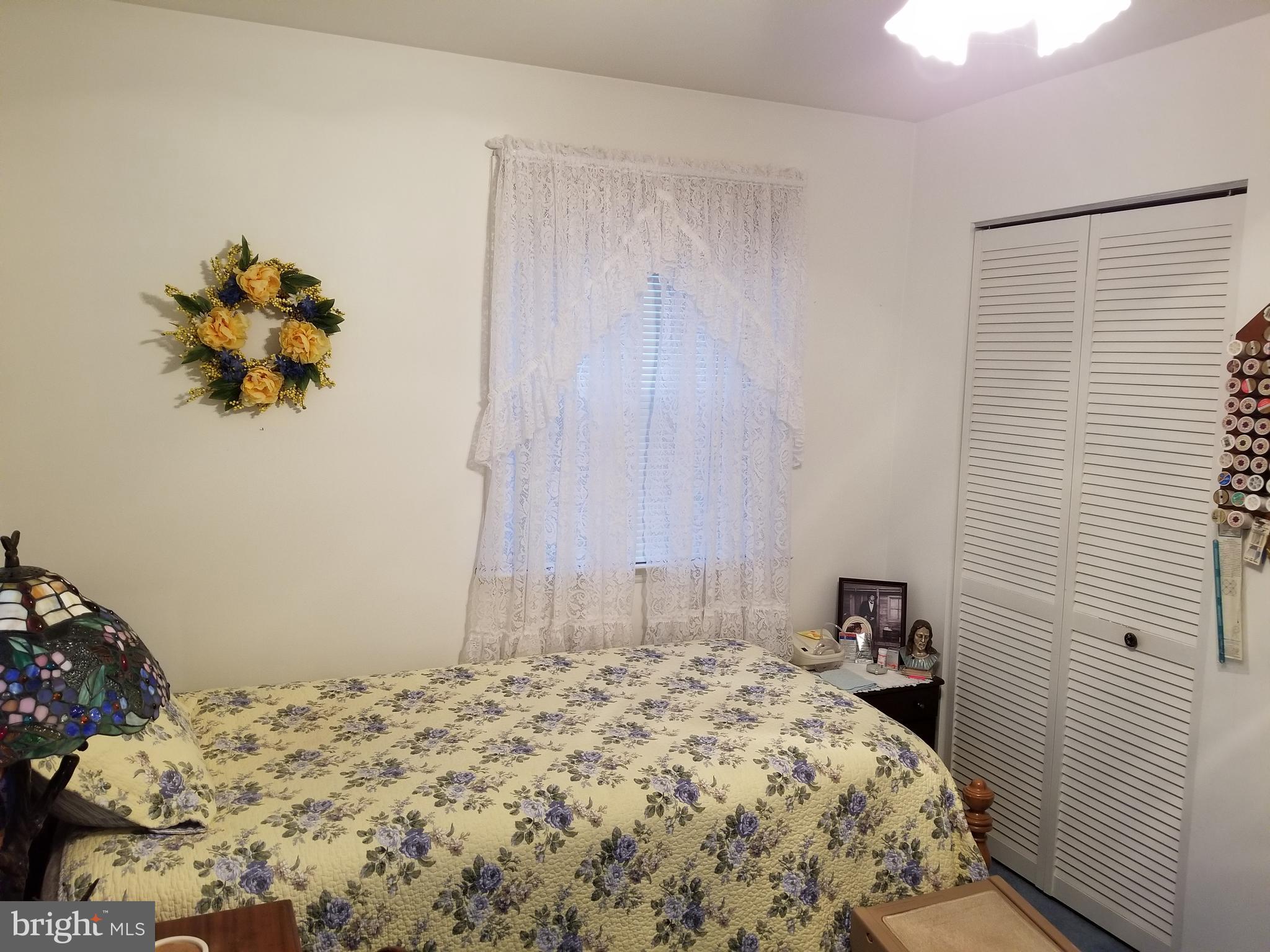 150 Kansas Road Pennsville, NJ 08070 - Photo 15 of 20 a bedroom with a bed and a window