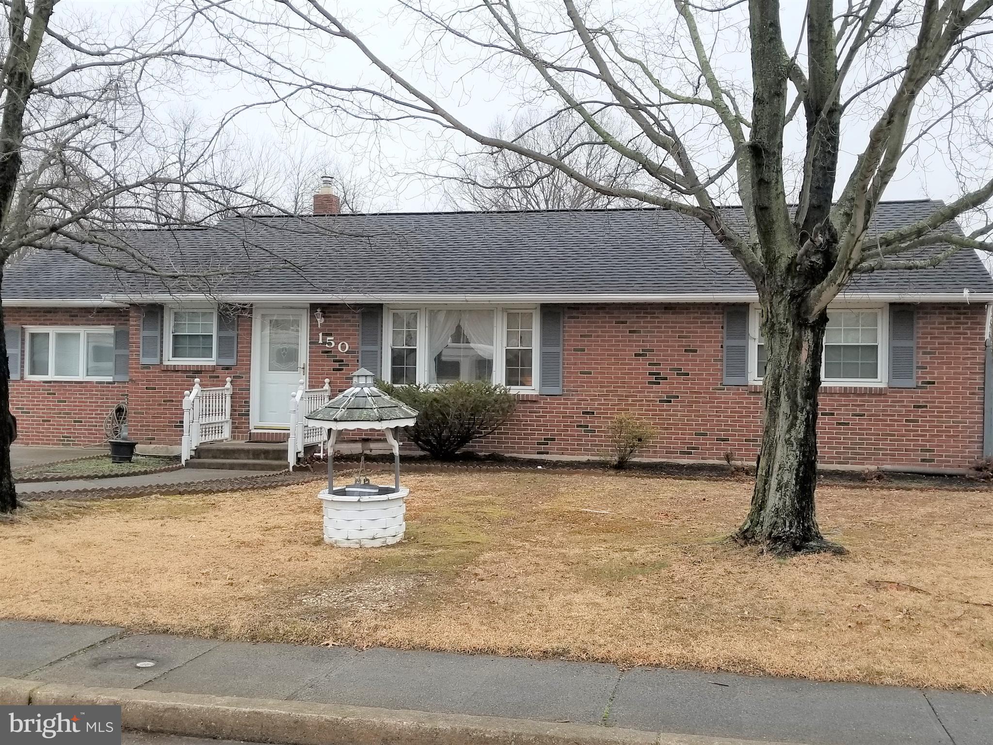 150 Kansas Road Pennsville, NJ 08070 - Photo 20 of 20 a front view of house with yard and trees around