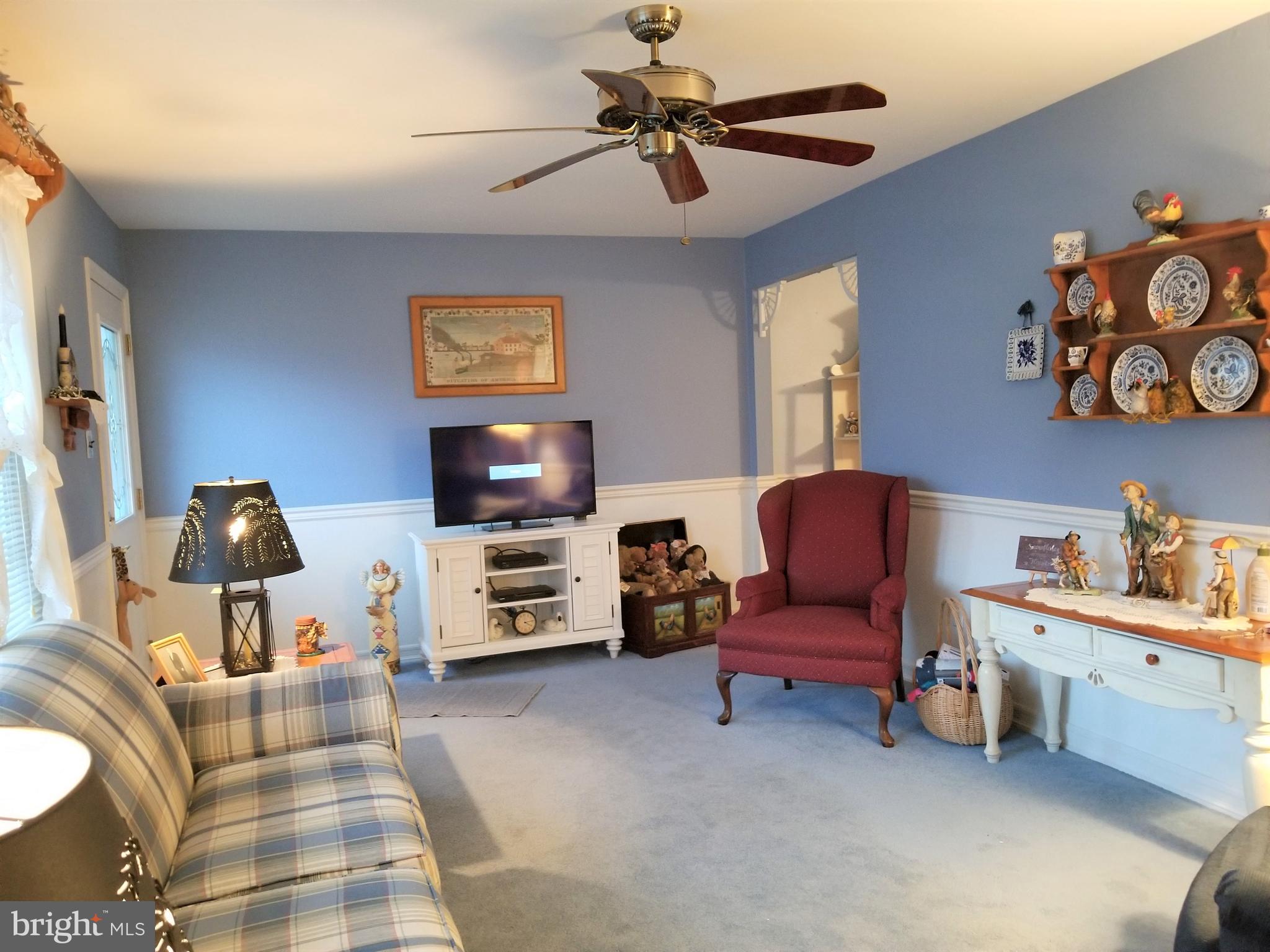 150 Kansas Road Pennsville, NJ 08070 - Photo 8 of 20 a bedroom with furniture and a flat screen tv