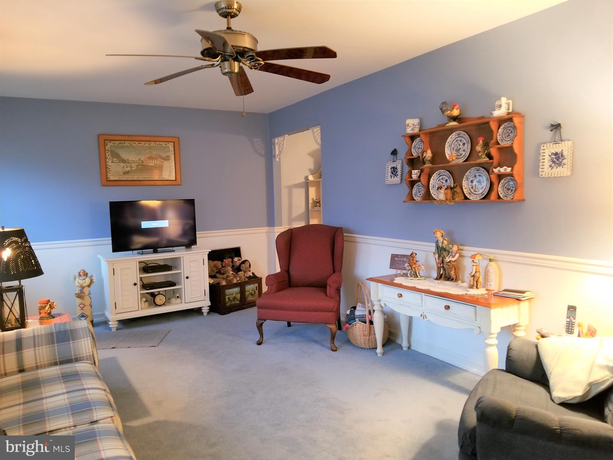 150 Kansas Road Pennsville, NJ 08070 - Photo 9 of 20 a bedroom with furniture and a flat screen tv