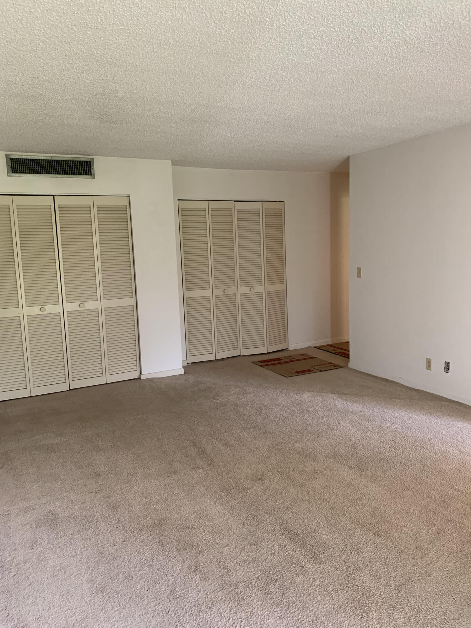 150 Pineview Road, Unit I4 Jupiter, FL 33469 - Photo 15 of 35 a view of an empty room with a window