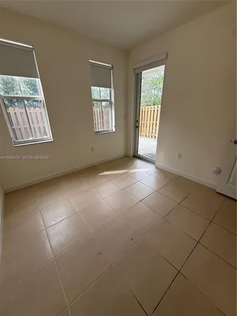 a front view of a building with glass windows