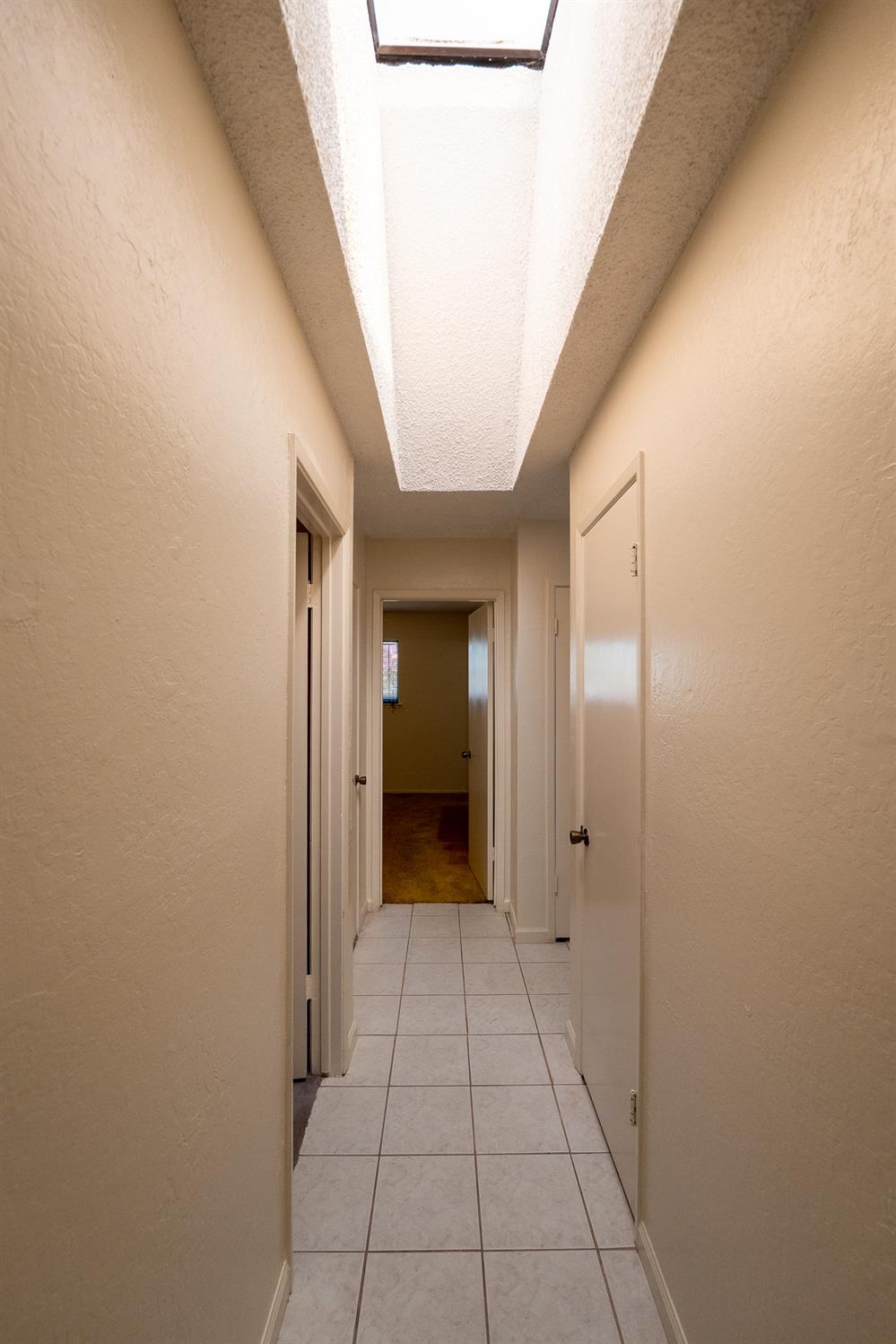 859 11th Street Sanger, CA 93657 - Photo 15 of 28 a view of a hallway