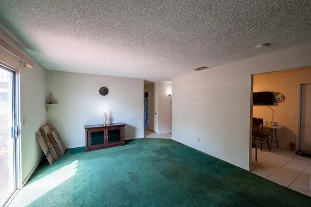 a view of a livingroom with furniture