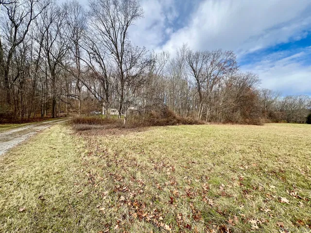 a view of a bench in a yard