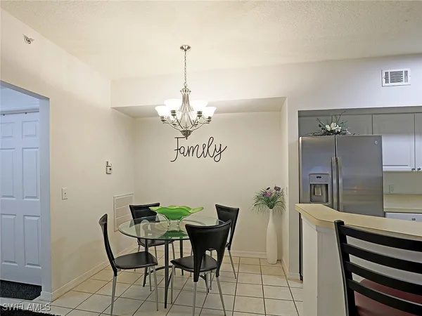 a bedroom with bed and a window