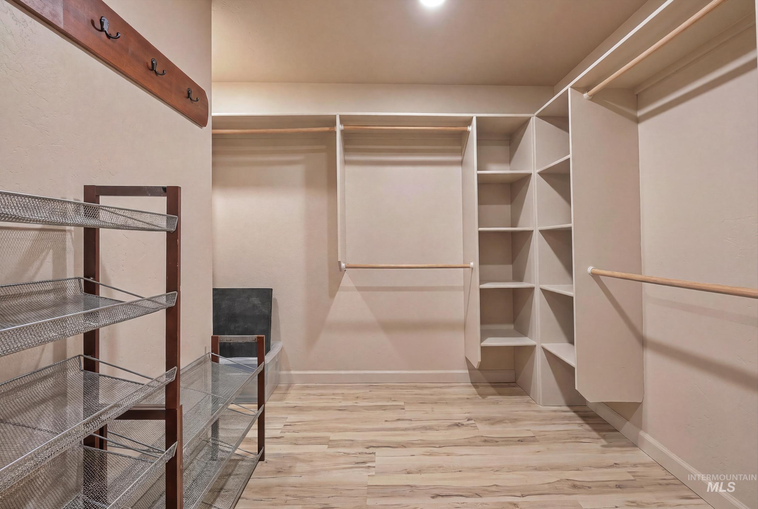 339 Airport Road Weiser, ID 83672 - Photo 27 of 49 Custom closet system featuring multiple shelves and hanging rods