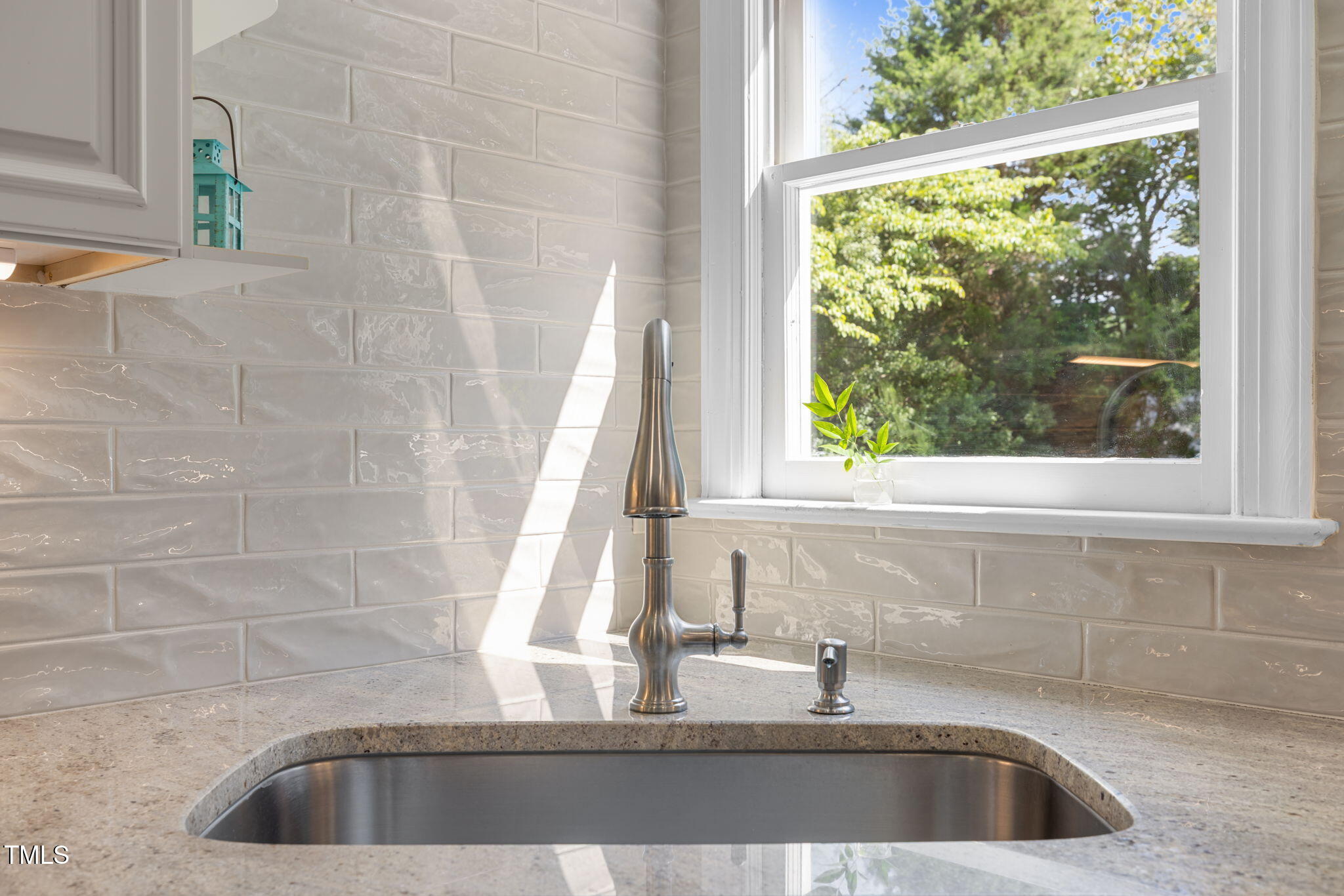 5909 Stable Court Raleigh, NC 27612 - Photo 10 of 45 a view of a sink and a window