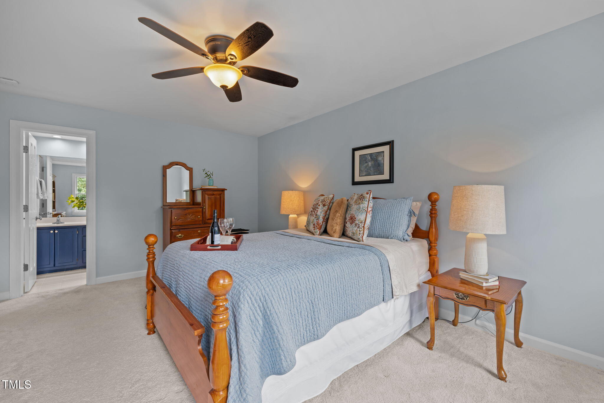 5909 Stable Court Raleigh, NC 27612 - Photo 25 of 45 a bed room with bed and window