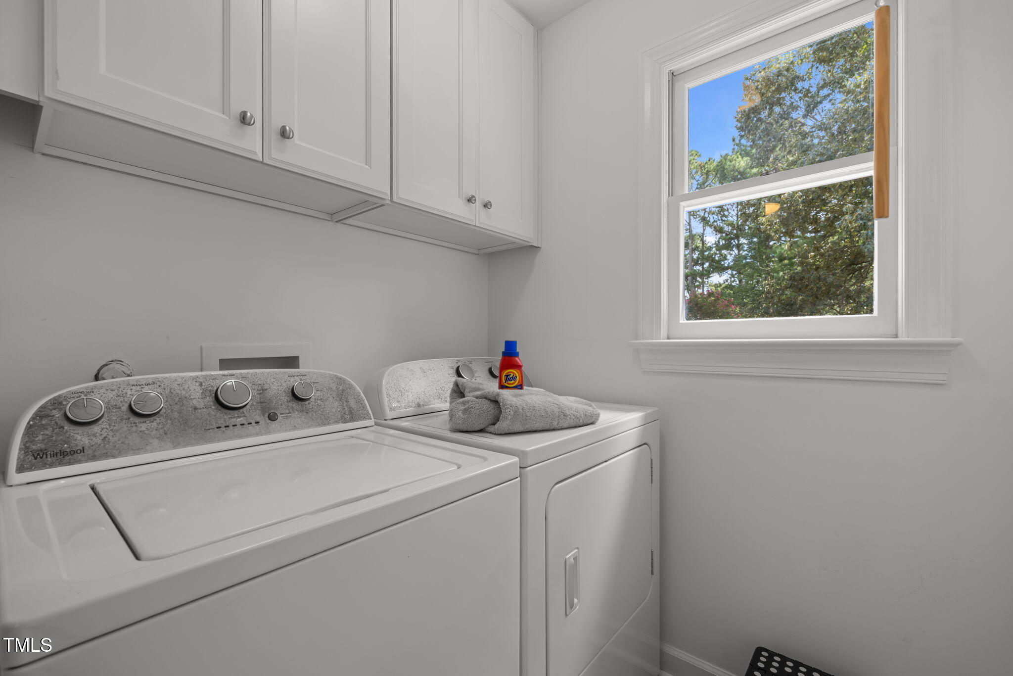 5909 Stable Court Raleigh, NC 27612 - Photo 29 of 45 a utility room with dryer and washer