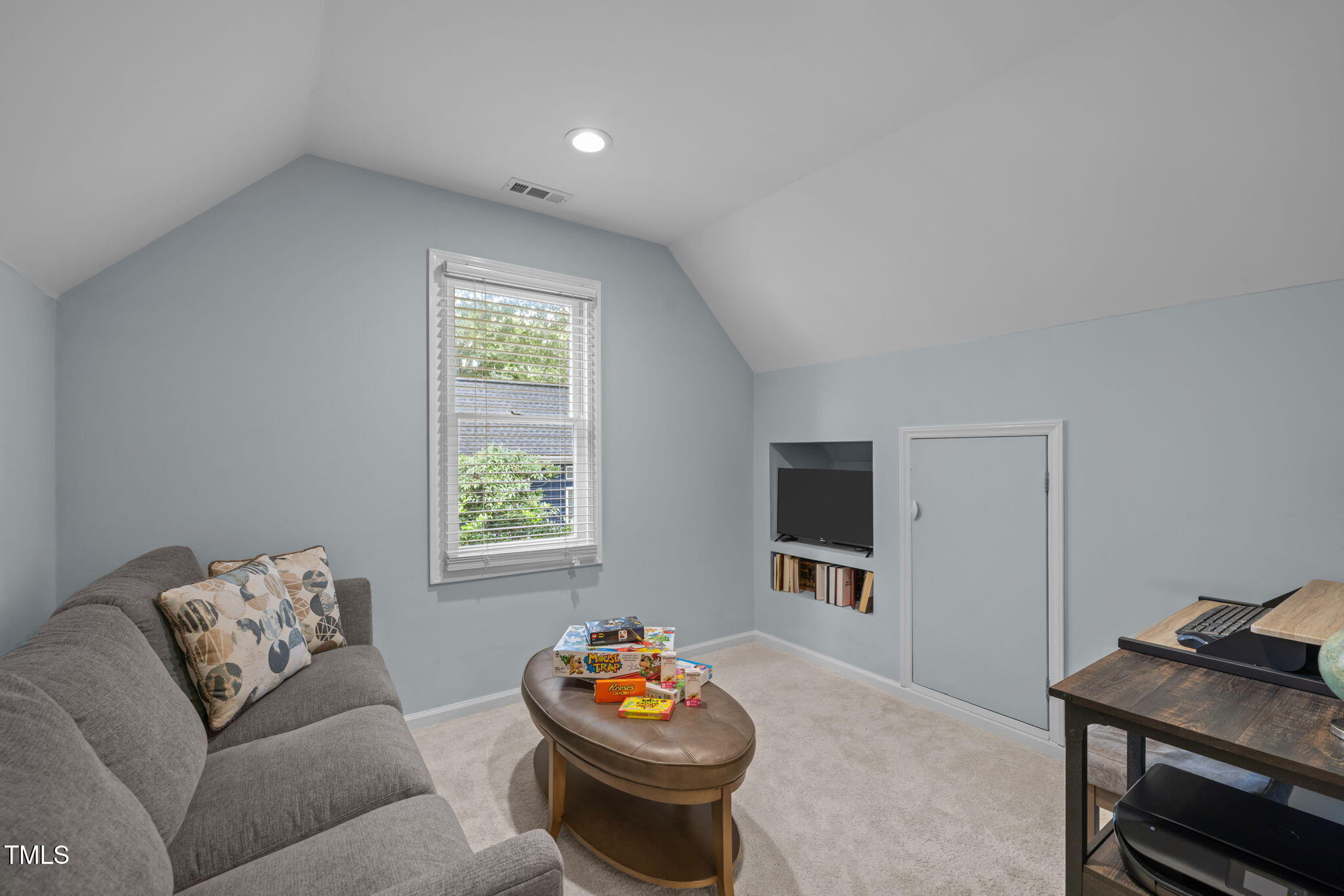 5909 Stable Court Raleigh, NC 27612 - Photo 34 of 45 a living room with furniture and a window