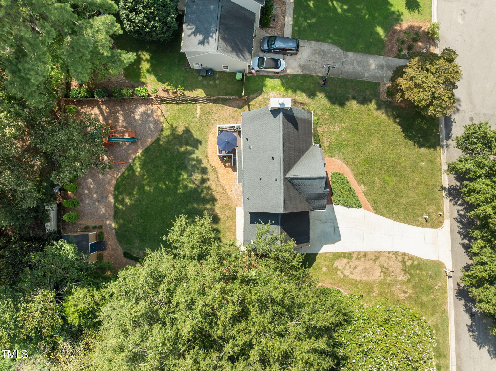 5909 Stable Court Raleigh, NC 27612 - Photo 3 of 45 an aerial view of houses with yard