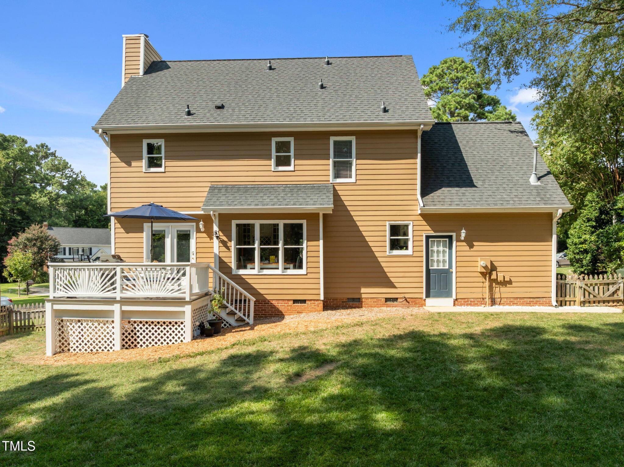 5909 Stable Court Raleigh, NC 27612 - Photo 40 of 45 front view of a house with a yard