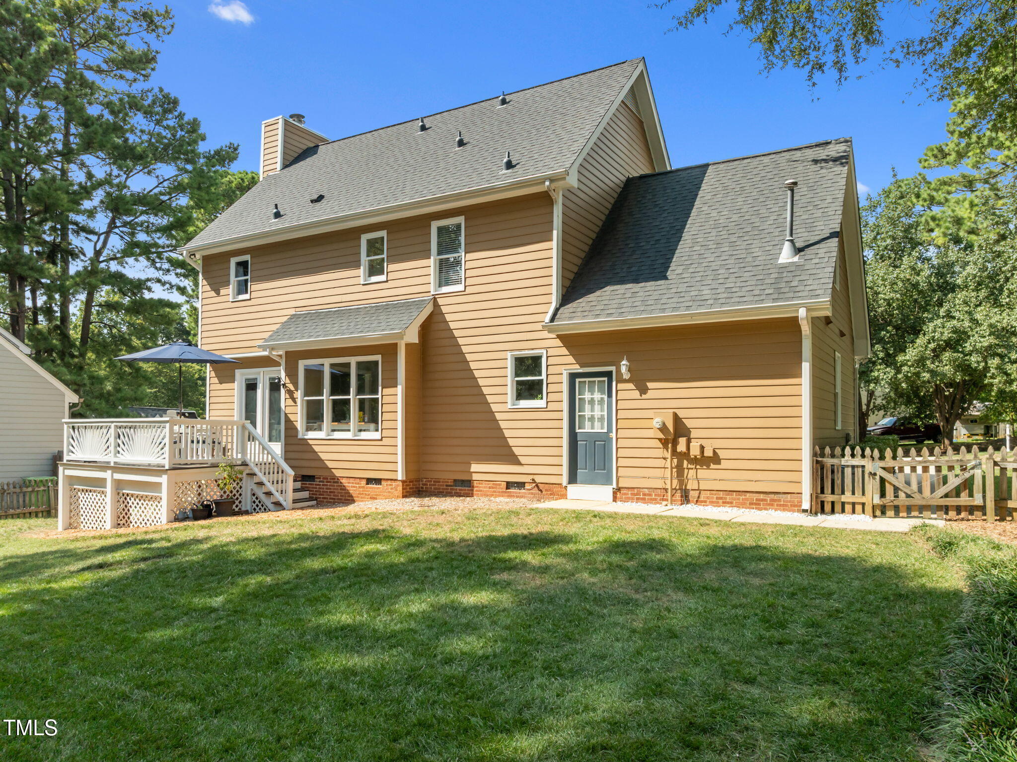 5909 Stable Court Raleigh, NC 27612 - Photo 41 of 45 a front view of a house with a yard