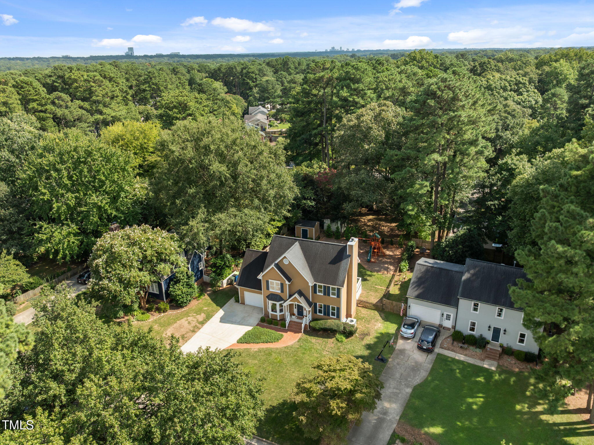 5909 Stable Court Raleigh, NC 27612 - Photo 43 of 45 an aerial view of a house with a yard