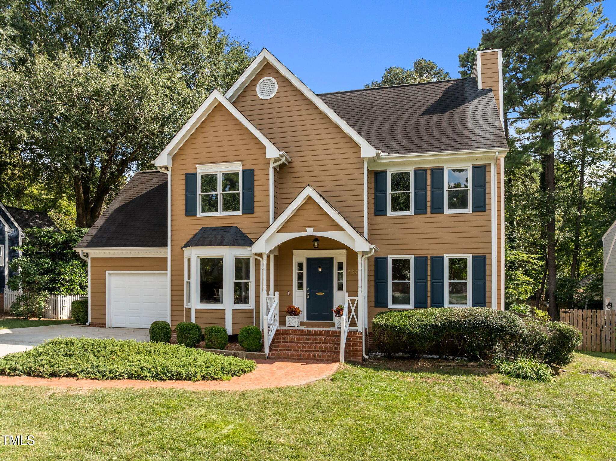 5909 Stable Court Raleigh, NC 27612 - Photo 44 of 45 a front view of a house with a yard