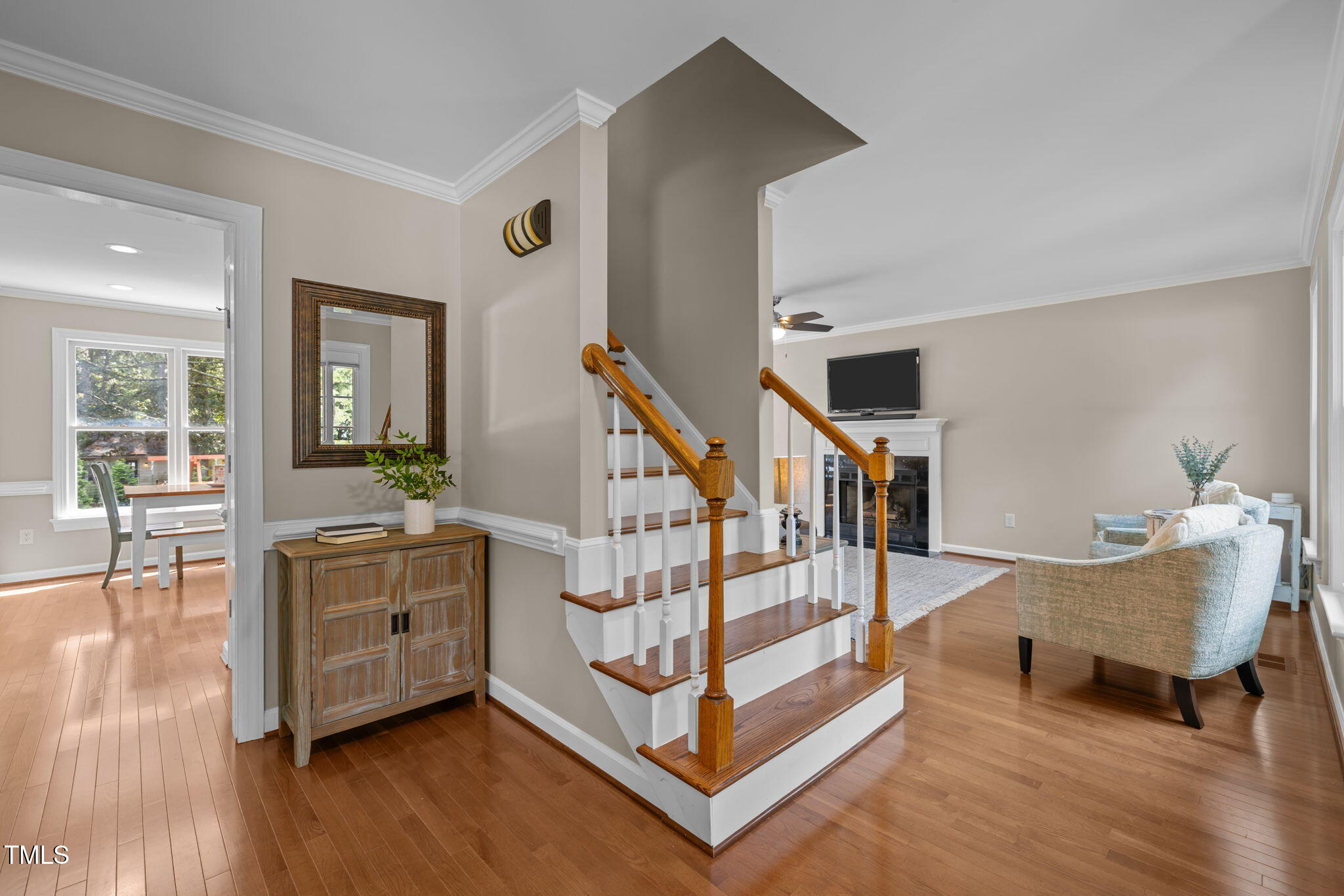 5909 Stable Court Raleigh, NC 27612 - Photo 5 of 45 a living room with furniture and wooden floor