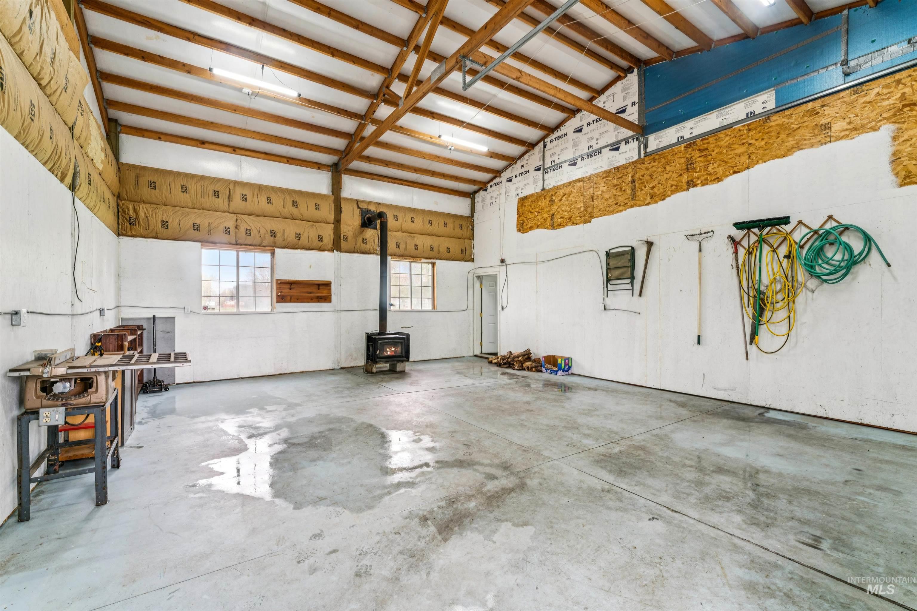 948 South Mill Road Emmett, ID 83617 - Photo 31 of 38 Garage with a wood stove