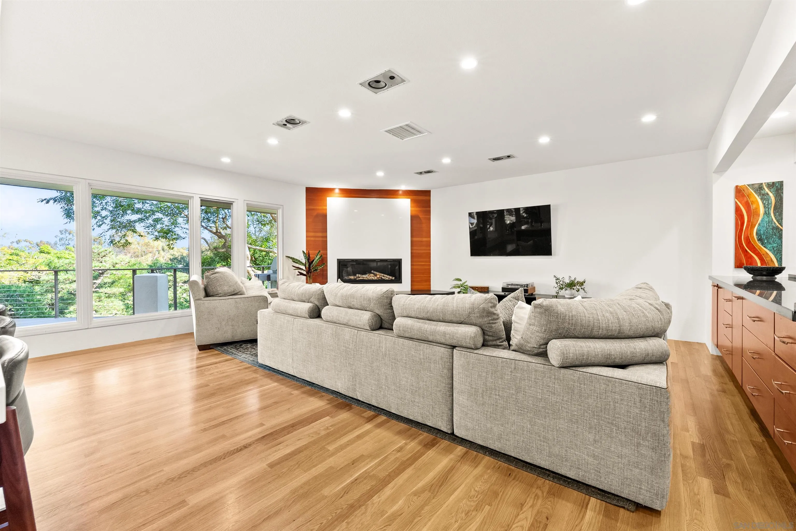 5491 Calzada Del Bosque Rancho Santa Fe, CA 92067 - Photo 16 of 69 a living room with furniture and a flat screen tv