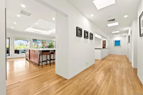 a bedroom with a bed and flat screen tv
