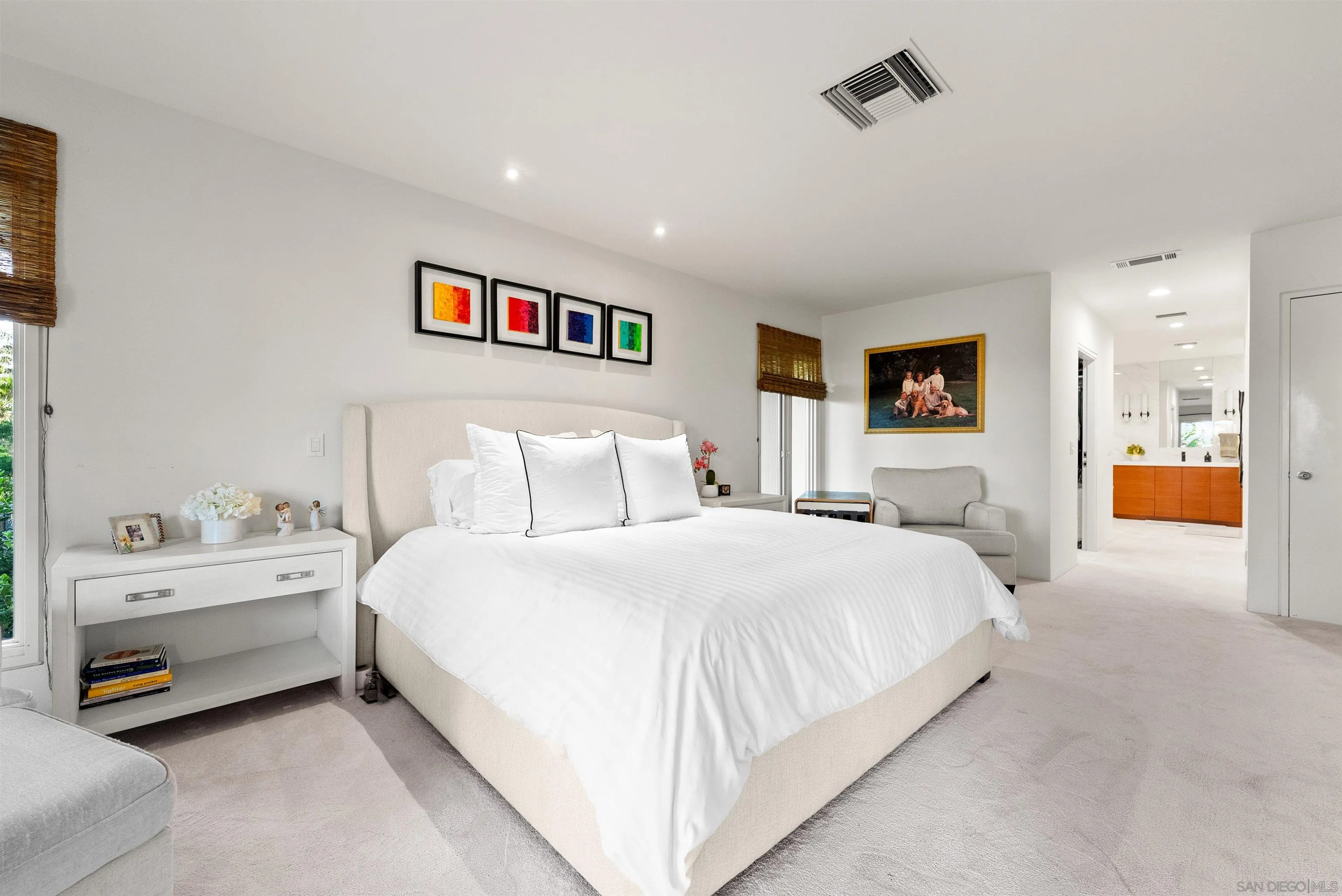 5491 Calzada Del Bosque Rancho Santa Fe, CA 92067 - Photo 23 of 69 a spacious bedroom with a bed and a lamp
