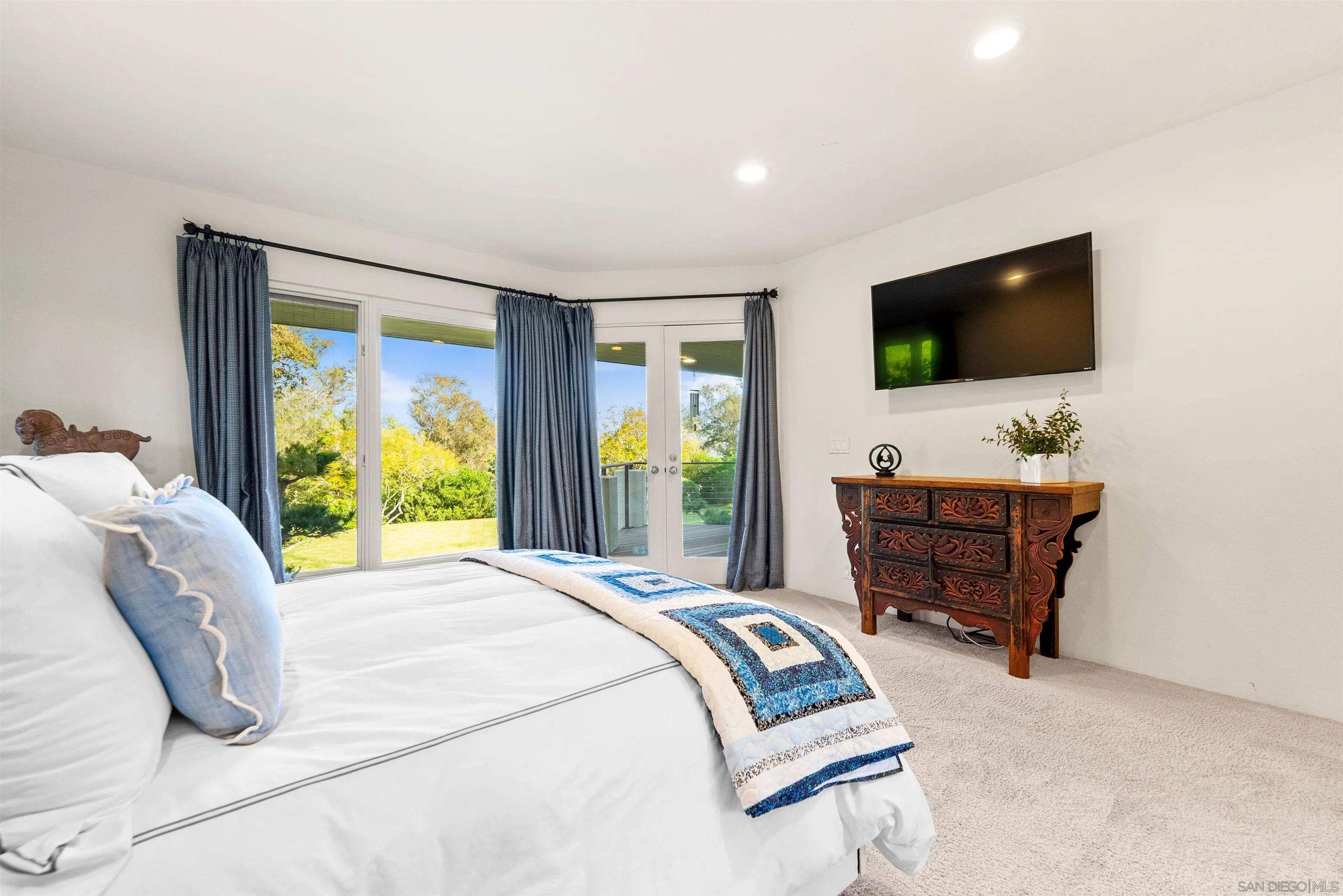 5491 Calzada Del Bosque Rancho Santa Fe, CA 92067 - Photo 29 of 69 a bedroom with a bed and flat screen tv