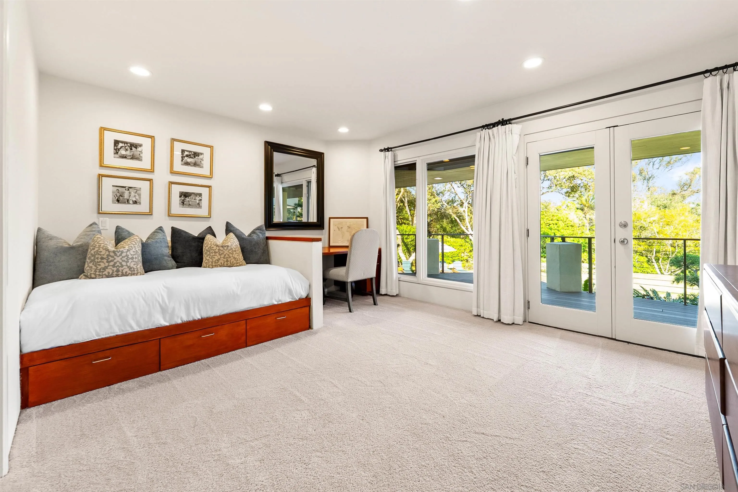 5491 Calzada Del Bosque Rancho Santa Fe, CA 92067 - Photo 31 of 69 a bedroom with a large bed and a large window