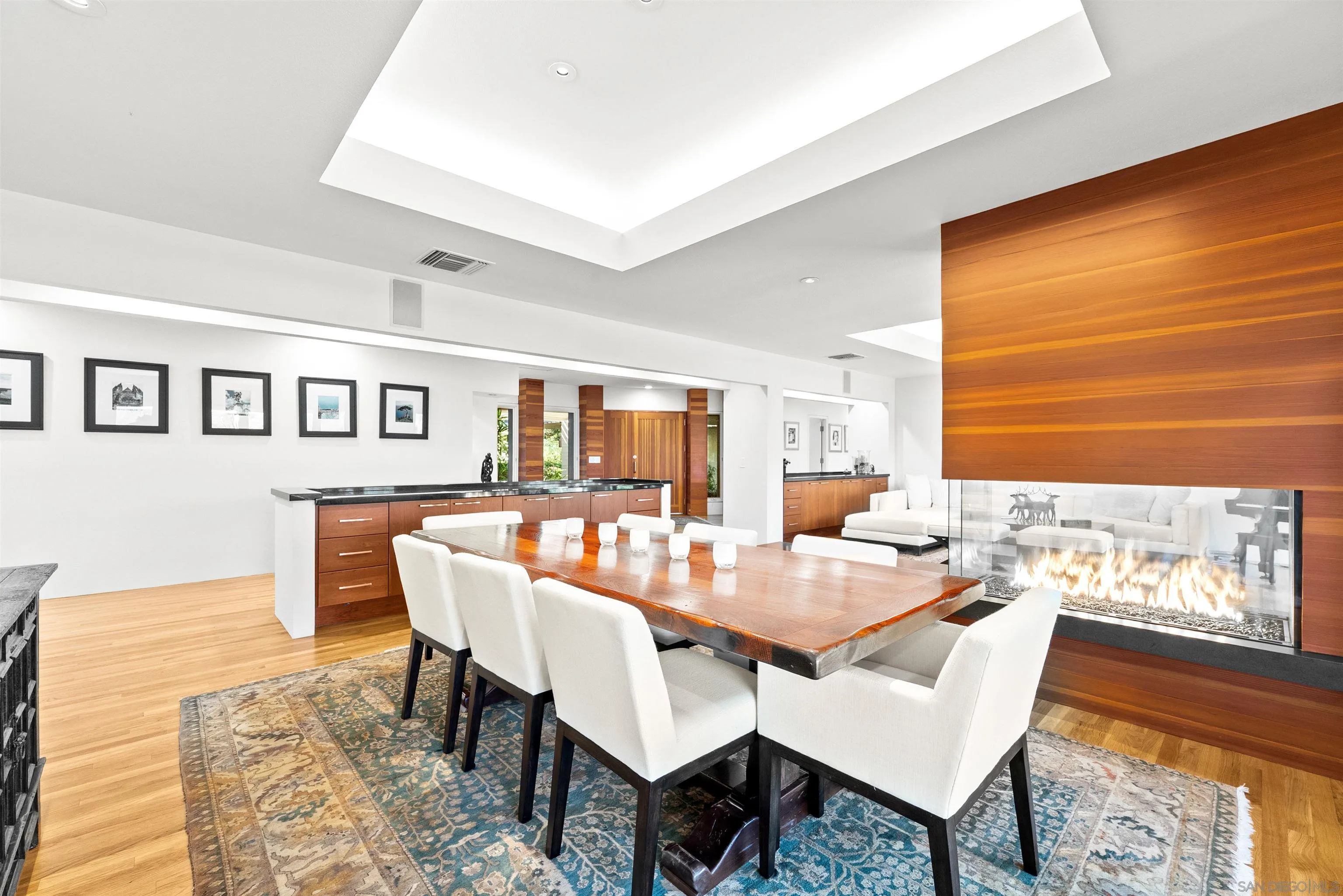 5491 Calzada Del Bosque Rancho Santa Fe, CA 92067 - Photo 5 of 69 a view of a dining room with furniture window and wooden floor
